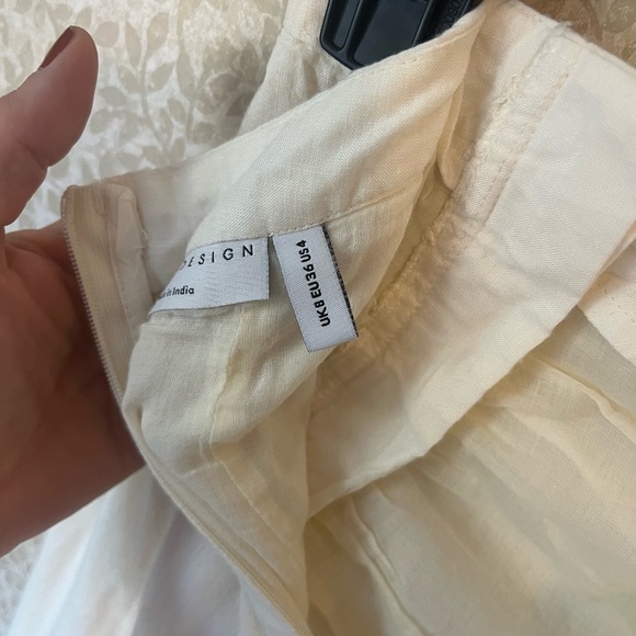 ASOS drapey button side split in cream. Size 4 cotton lining - Picture 3 of 10